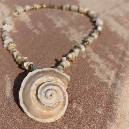 Sea Whisperer necklace — ivory shell beads with spiral shell pendant